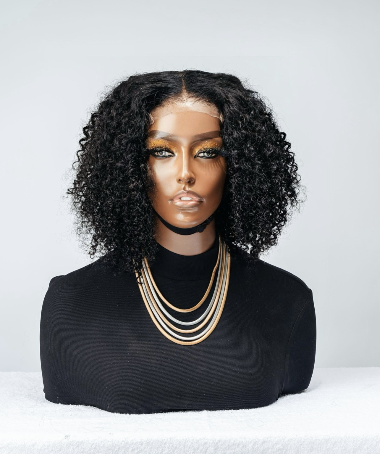 Jerry Curl 4x4 Bob Wig is a glueless unit that has tight coiled curls.